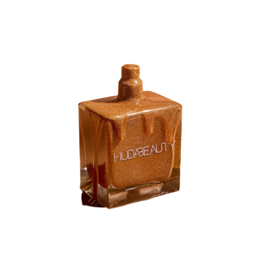 N.Y.M.P.H. BODY DRIP Shimmering Dry Oil - HUDA BEAUTY / Aceite para cuerpo con brillo *Pre-Orden
