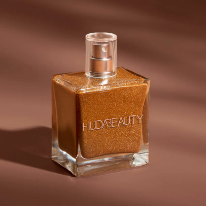 N.Y.M.P.H. BODY DRIP Shimmering Dry Oil - HUDA BEAUTY / Aceite para cuerpo con brillo *Pre-Orden